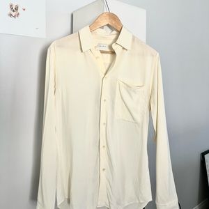 Button up shirt from Sandro. Beautiful crème color. Worn only twice.